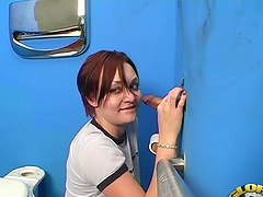 Horny amateur chick receives cum in mouth thru a gloryhole