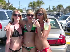 Outdoors amateur video of naughty babes in bikinis flashing butts