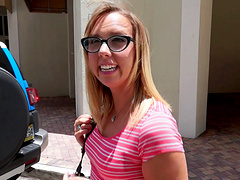 Glasses wearing slut gets a shaved pussy pounding in this reality porn video.