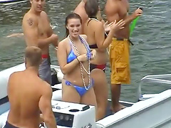 Affectionate babes in bikini displaying her big tits at the party outdoor
