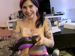 Tattooed chick Joanna Angel drops on her knees to give a blowjob