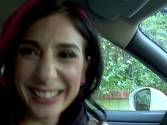 Horny babe Joanna Angel fingers her pussy in back of the car