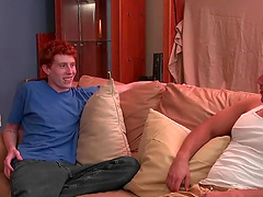 Redhead gay dude enjoys while giving a nice blowjob to his lover