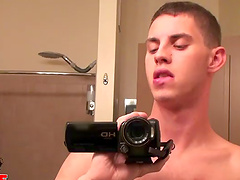 Solo dude jerking off his massive raging cum gun in the bathroom