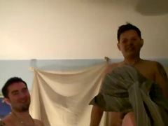 Drunk gay dudes get horny and start sucking dick around the room