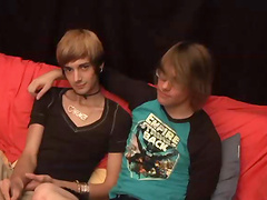Horny homosexuals having fun while dicking on the red sofa