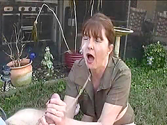 Hot MILF Gives an Impressive Handjob Outdoors