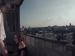 Erotic fucking on the balcony with a skinny girlfriend with glasses