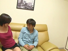 Japanese woman enjoys while riding her boyfriend's dick on the sofa