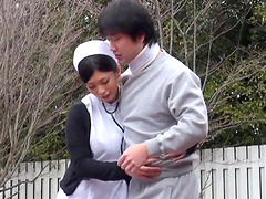 Naughty Japanese nurse enjoys having outdoors sex with a patient