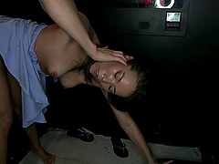 Kalina Ryu having fun while sucking a dick thru a gloryhole