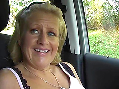 Robyn Ryder enjoys while fingering her pierced clitoris in the car