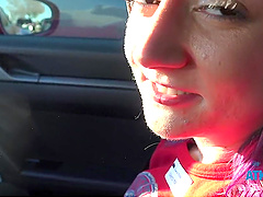 POV video of brunette Lily Adams giving a blowjob in the car