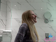 Cute blonde teen Paris White gets ready in the bathroom