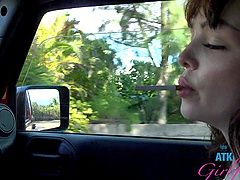 Cute brunette babe Aliya Brynn shows her pink pussy in the car