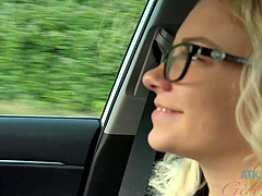 Lovely blonde nerd Riley Star eats ice cream in the car