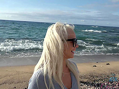 Sexy blonde girl Elsa Jean showing her hot figure on the beach