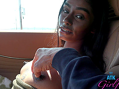 Fae Love with natural tits enjoys while being fingered in the car