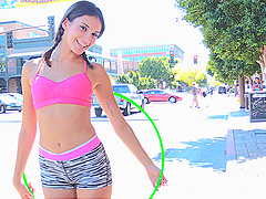 Long-haired brunette solo model teases with pigtail