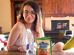 Glasses-clad girl teases in panties and crop top in the kitchen