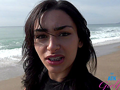 Latina babe with big naturals gets off on the beach