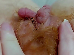 Hairy goddess shows off her juicy pussy up close