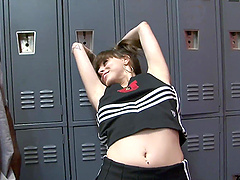 Brunette hottie gives a sloppy blowjob in the locker room