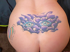 Christie Stevens is a tattooed blonde and she gives a great handjob.