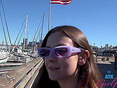 Beautiful woman with glasses has sex outside in nature.