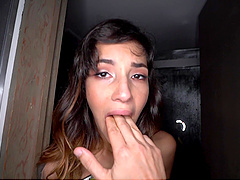 Beautiful long-haired brunette gets a facial from a professional cock sucker.