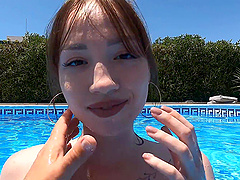 Natural tits and a shaved pussy in a hot pov scene by the pool.