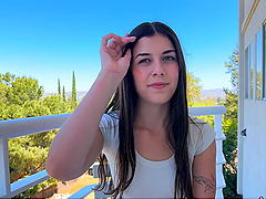 Lily's luscious locks frame her as she sucks Alex's thick cock