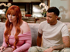 Redheaded MILF Lauren devours Lawson's thick cock in a steamy interracial encounter