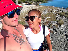 Asian babe gives a steamy blowjob on sunny beach wearing her sexy glasses