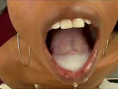 Ebony whore gets a mouthful of cum