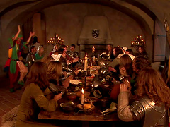 Hot group sex scene around a medieval dining table