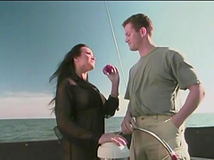 Asia Carrera moans while her pussy is being licked on the boat