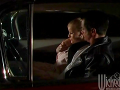 Provocative babe gives a blowjob and rides a dick in the car