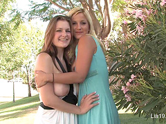 Beautiful blondes enjoy outdoor lesbian sex.