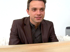 Gay men having sex with each other in a hot scene.