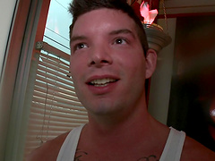 Gay porn star Alexander Garrett in hot scene with a hunk.