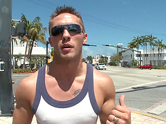 Gay men having sex with each other in a hot scene.