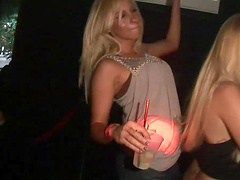 Naughty babes flash their butts and tits during a public party