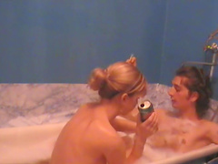 Amateur video of a horny couple having sex in the bathtub