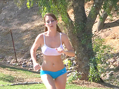 Athletic chick showing you her natural big boobs after a run