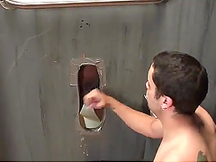 Gloryhole dick sucking between a white gay man and a black dude
