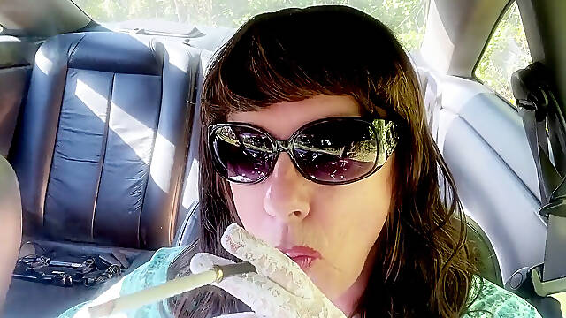MRS. ROMAN possessor SMOKING VS120s WITH milky LACE GLOVES AND SUNGLASSES